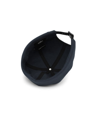 Watch cap in a cityscape setting