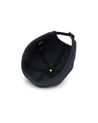 Watch cap in a cityscape setting