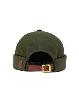 Brimless cap with an embroidered logo