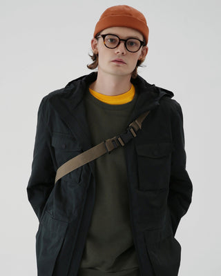 Brimless cap in a natural outdoor setting