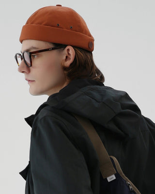 Brimless cap in a beach environment