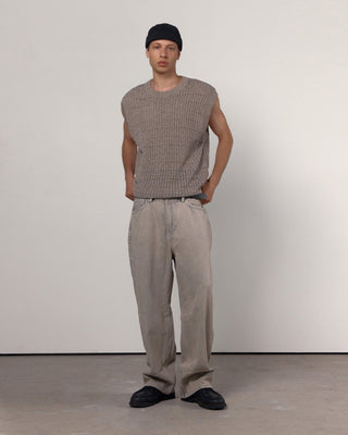 Brimless cap displayed on a mountain backdrop