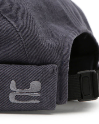 Brimless cap in a natural outdoor setting