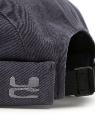 Brimless cap in a natural outdoor setting