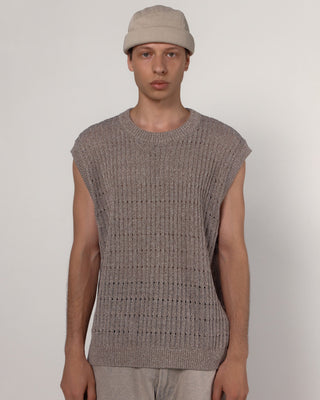 Brimless cap displayed on a mountain backdrop