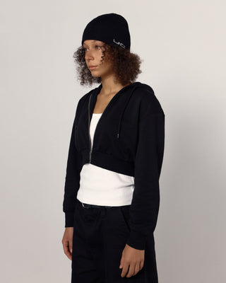 Beanie paired with a scarf and gloves