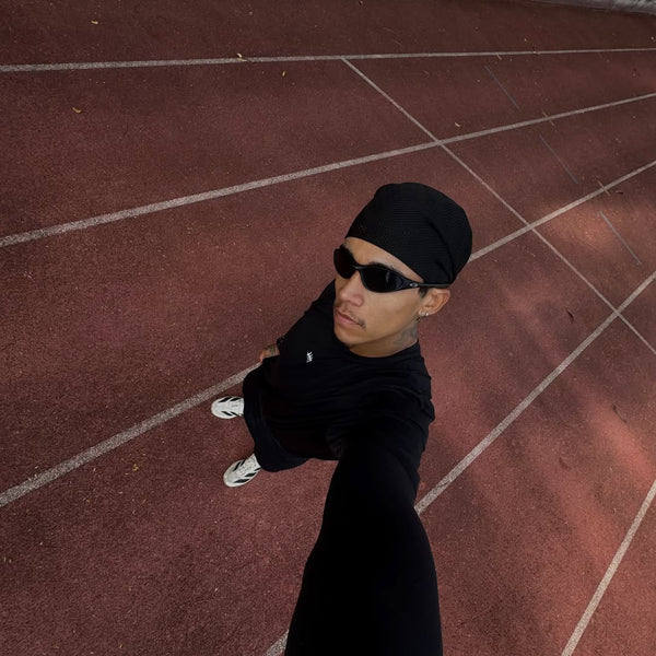 @themagic.run wearing URH BREEZE Mush Scarf