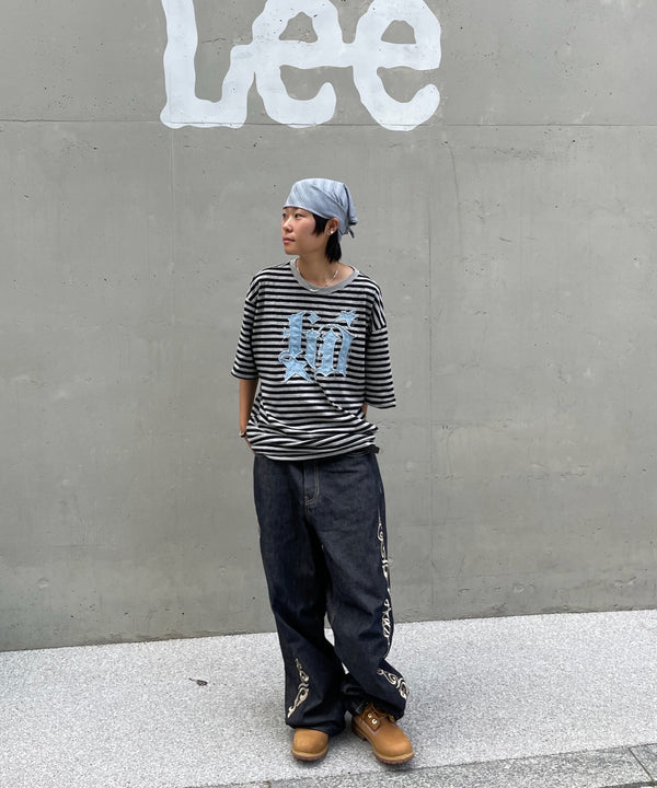 @eliomuse wearing URH BREEZE Mush Scarf