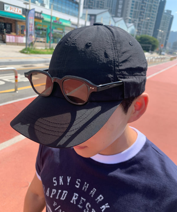 @slozk wearing URH OPT Washed Cap