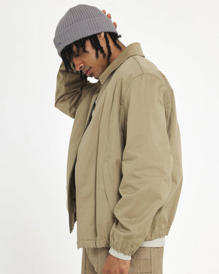 model-wearing-undercontrol-brand-gray-rib-knit-beanie-photo