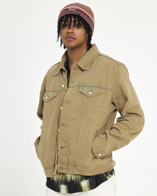 model-wearing-undercontrol-brand-pink-color-beanie-with-signature-logo-photo