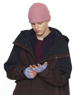 model-wearing-undercontrol-brand-pink-knit-beanie-photo