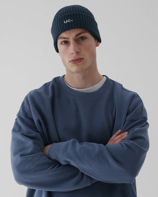 model-wearing-undercontrol-brand-rib-pattern-knit-beanie-photo
