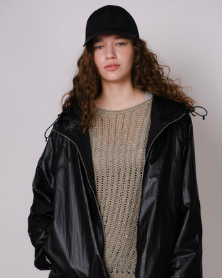 female-model-wearing-undercontrol-brand-black-color-nylon-cap-photo