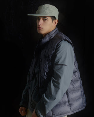 model-wearing-urh-brand-khaki-flat-visor-camp-cap-photo