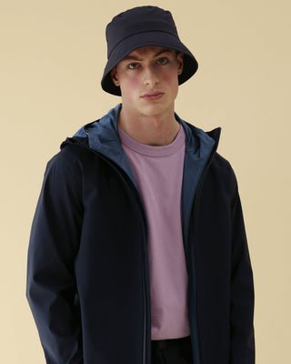model-wearing-urh-brand-navy-xanadu-bucket-hat-photo