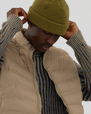 model-wearing-urh-brand-mustard-yellow-natu-beanie-photo