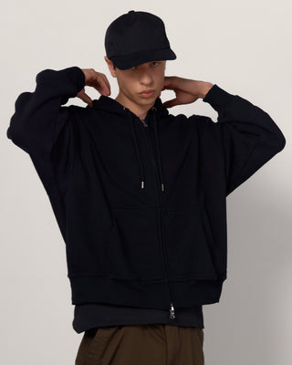 model-wearing-undercontrol-brand-5-panel-trucker-pattern-flat-visor-ball-cap-photo