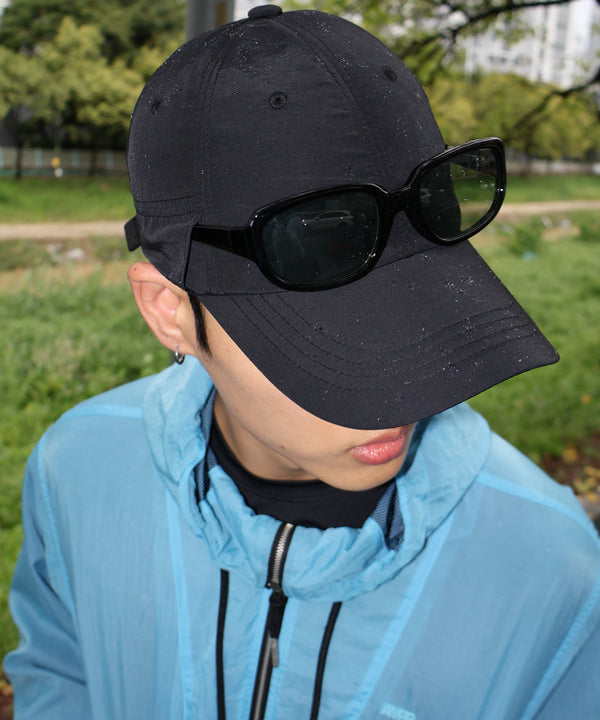 @183.h.g wearing URH OPT Washed Cap