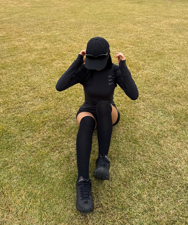 @flsl_ow.ly wearing URH OPT Washed Cap