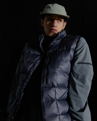 Camp cap as part of a hiking outfit.