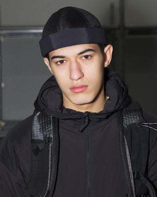 Stylish watch cap on a hiking trail