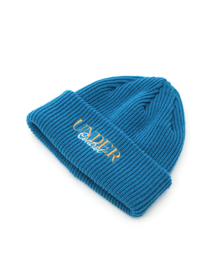  - Collection of colorful beanies on display