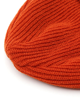  - Short beanie in a cozy indoor setting