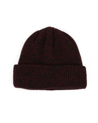 Model wearing a short beanie in winter