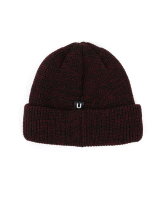 Collection of colorful beanies on display