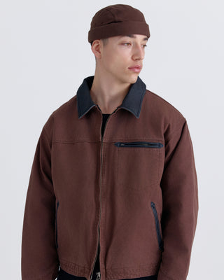 Brimless faded black cap front view