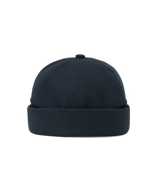 Group of friends wearing brimless caps on a camping trip