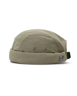 Brimless cap in a natural outdoor setting